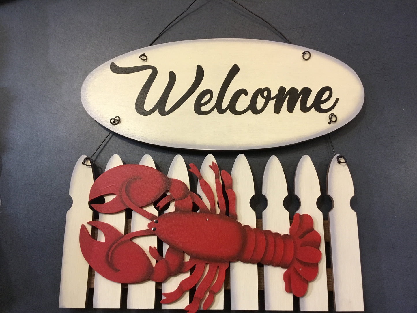 Décoration en bois : clôture de bienvenue en forme de homard