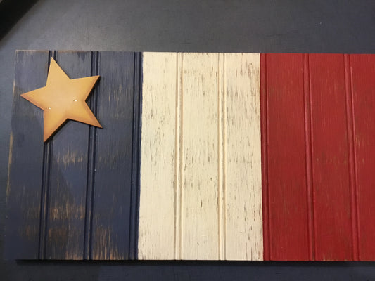 Décoration en bois : ancien drapeau acadien