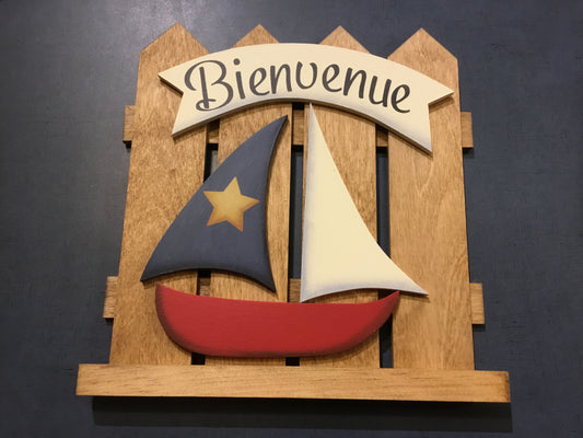 Décoration en bois : Clôture acadienne avec bateau