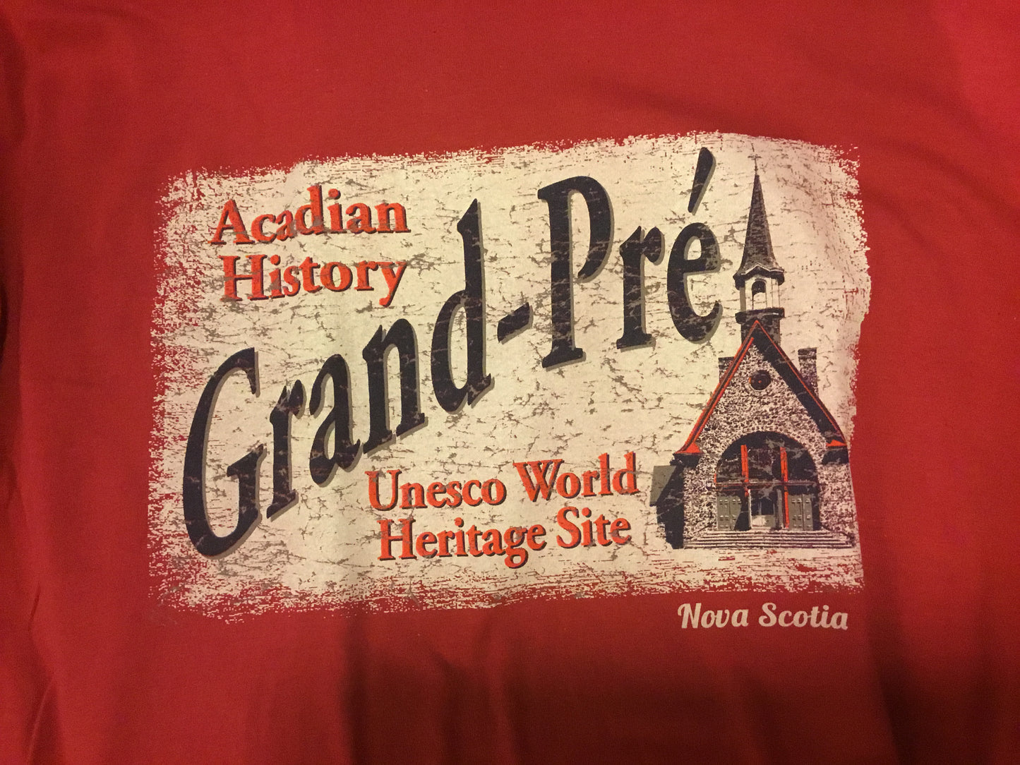 T-shirt : Histoire acadienne unisexe Grand-Pré Site du patrimoine mondial de l'UNESCO